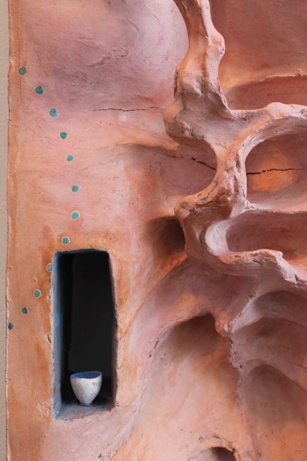 orange biomorphic sculpture by val gilman 
